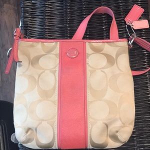 Tan and coral coach purse